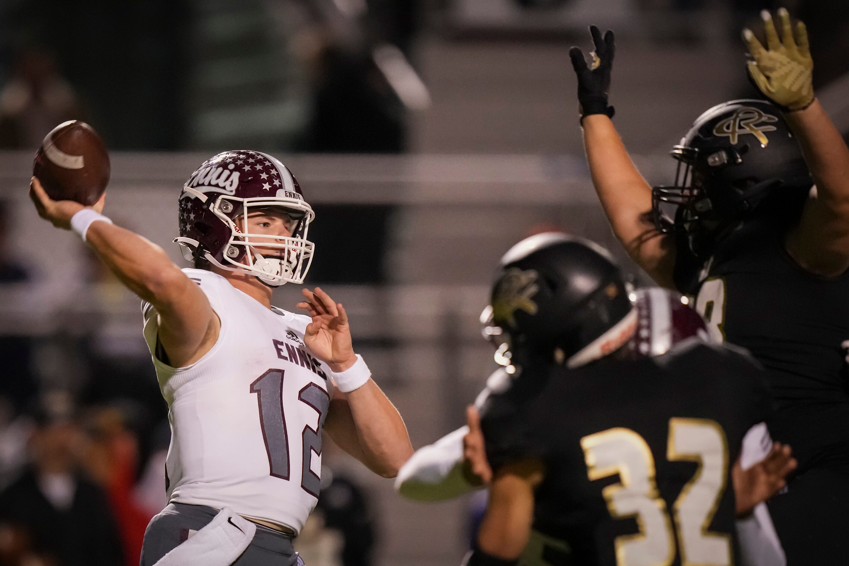 Ennis quarterback Jackson Gilkey (12) throws a pass during the second quarter of a District...