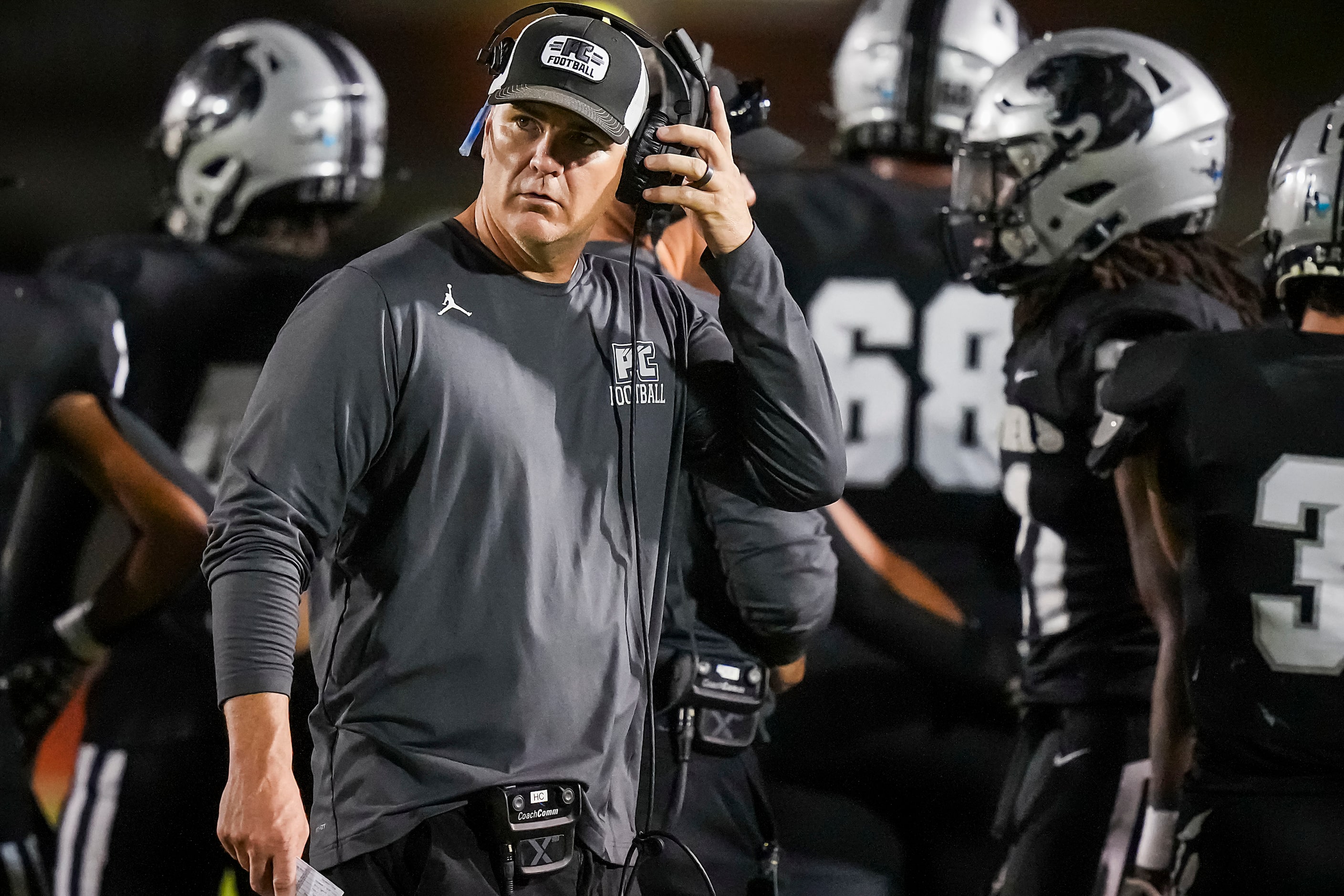 Panther Creek head coach Clint Surratt on the sidelines during the first half of a District...