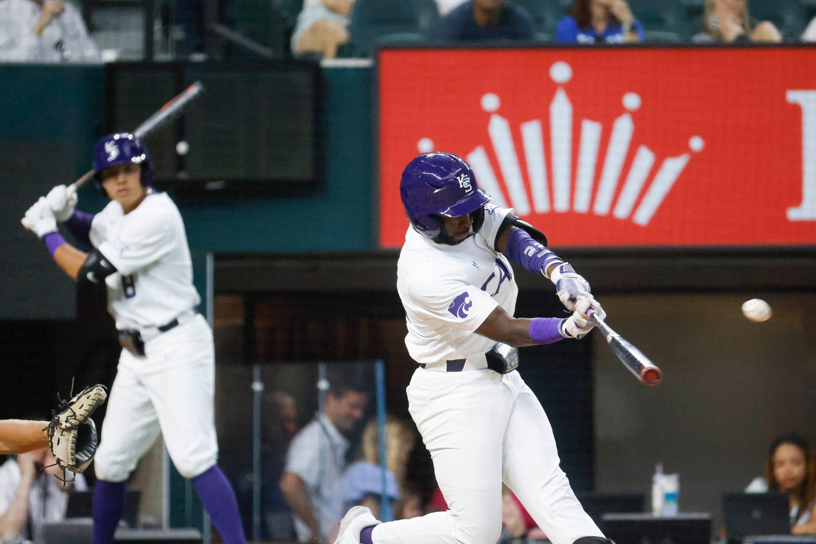 Kansas St. infielder Kaelen Culpepper hits a homer during the second inning of a baseball...