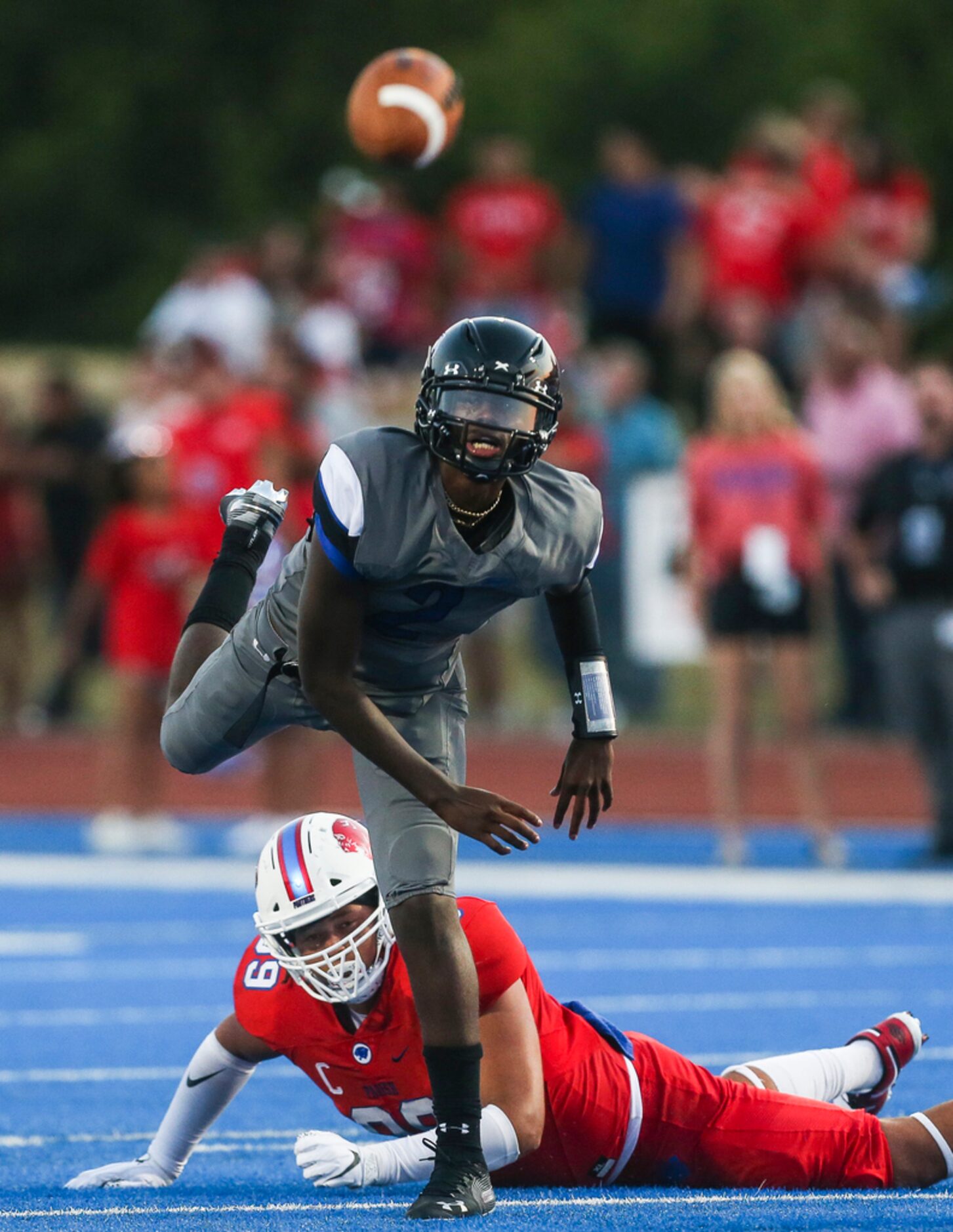 Trinity Christian-Cedar Hills quarterback Shedeur Sanders (2) fires off a pass after...