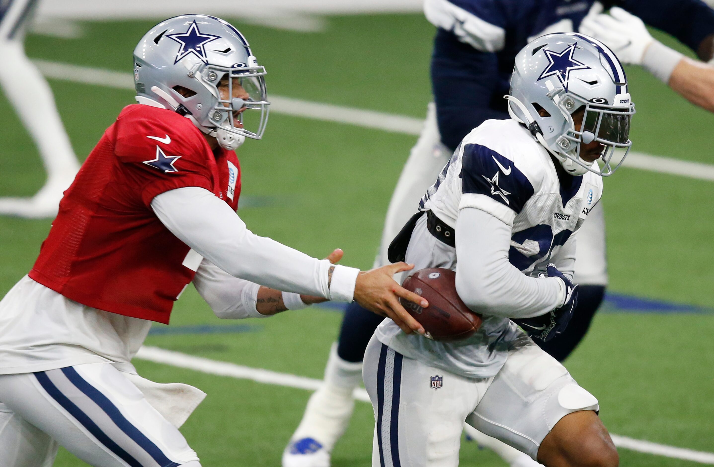 Dallas Cowboys quarterback Dak Prescott (4) and Dallas Cowboys running back Tony Pollard...