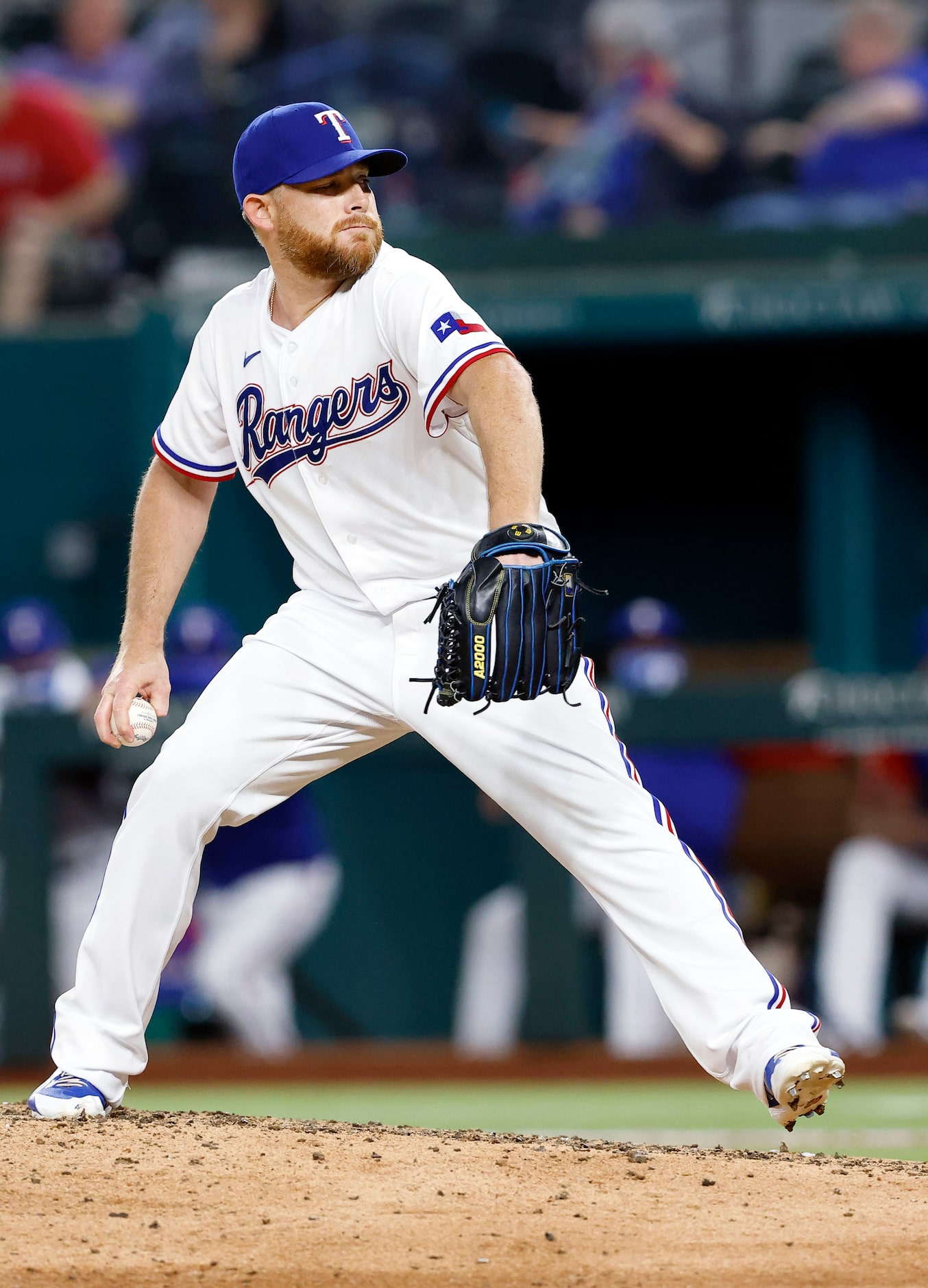 Texas Rangers relief pitcher Ian Kennedy (31) throws against the Boston Red Sox during the...