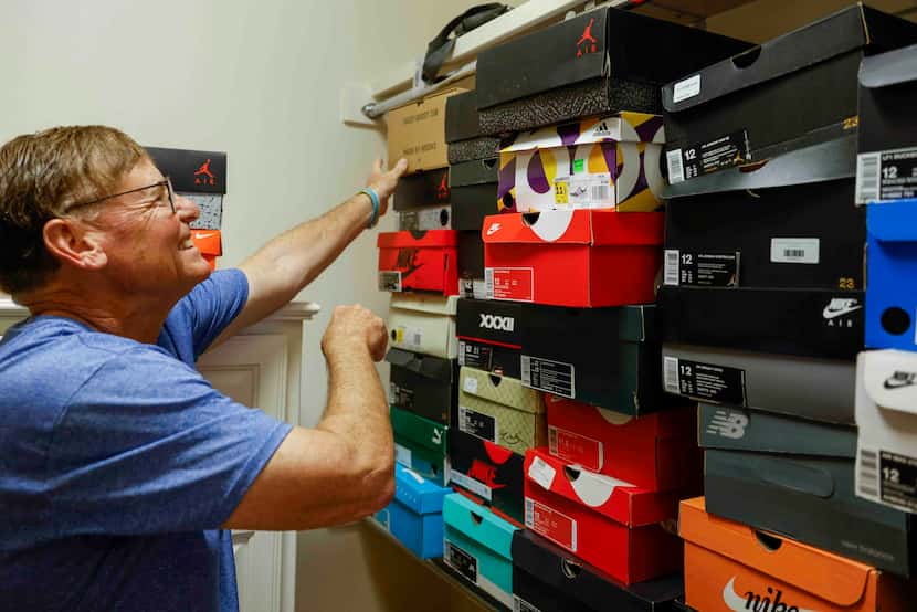 Tom Hund, father of late Dan Hund, organizes a part of Dan’s sneaker collection on Tuesday,...