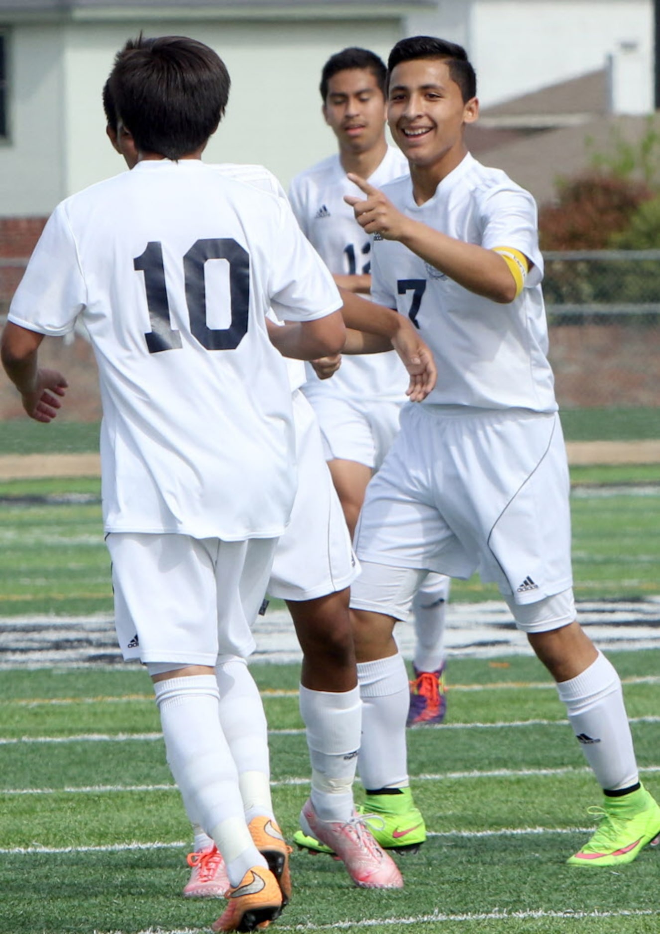 Life Oak Cliff's Jose Rodriguez (7) was all smiles as he points to acknowledge teammate...