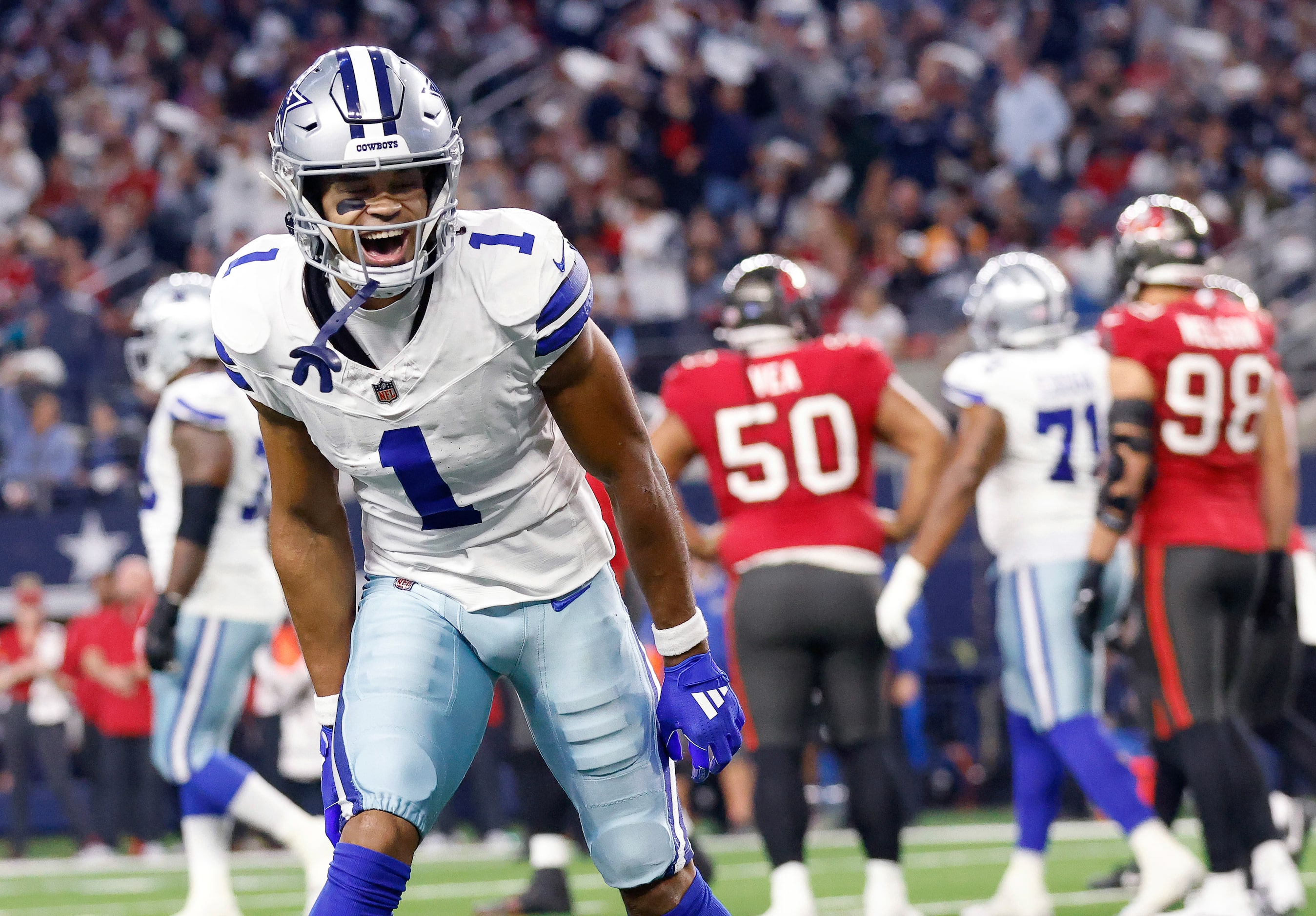 Dallas Cowboys wide receiver Jalen Tolbert (1) celebrates his first quarter touchdown catch...