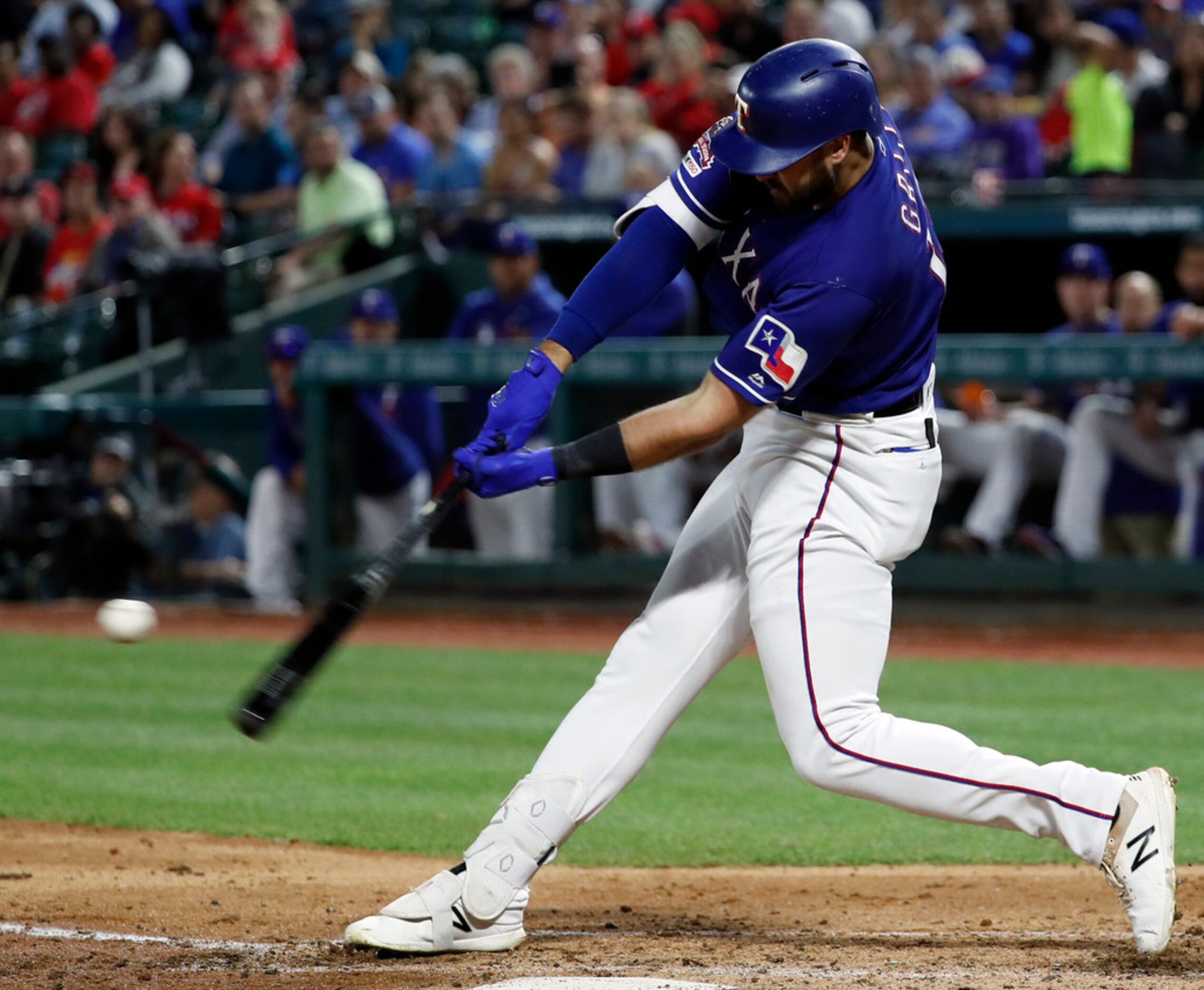 Texas Rangers' Joey Gallo connects for a two-run home run off Los Angeles Angels relief...