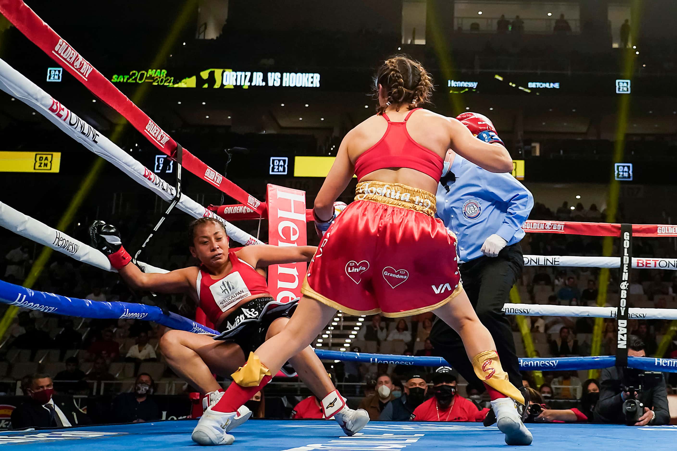 Anabel Ortiz is knocked into the ropes by Seniesa Estrada during a the WBA women’s...