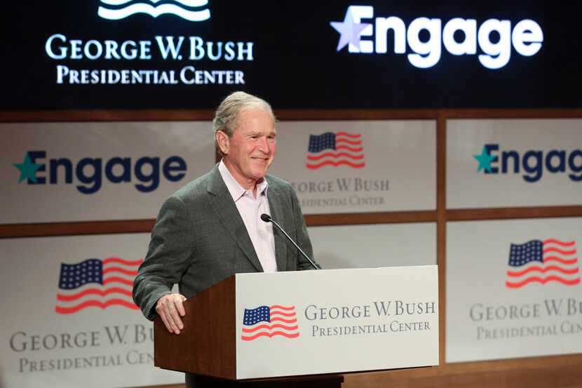 Former President George W. Bush addresses the audience in a surprise visit promoting...