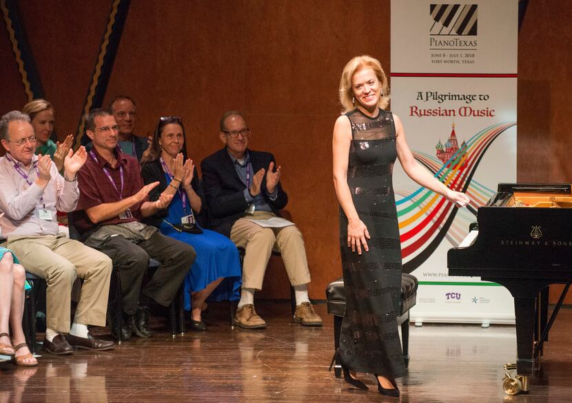 Olga Kern, winner of the 2001 Cliburn Gold Medal, bows after performing Beethoven's...