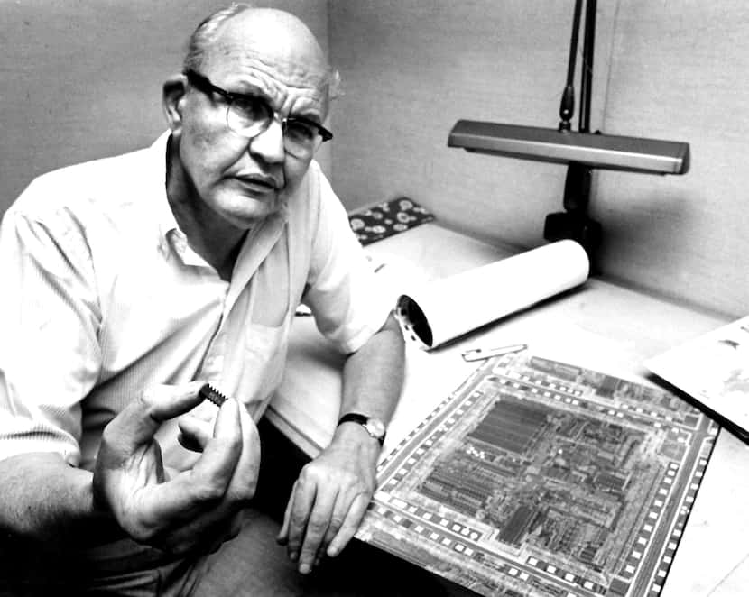 8/19/1982 --- Jack Kilby holds an integrated circuit in his right hand that contains a...
