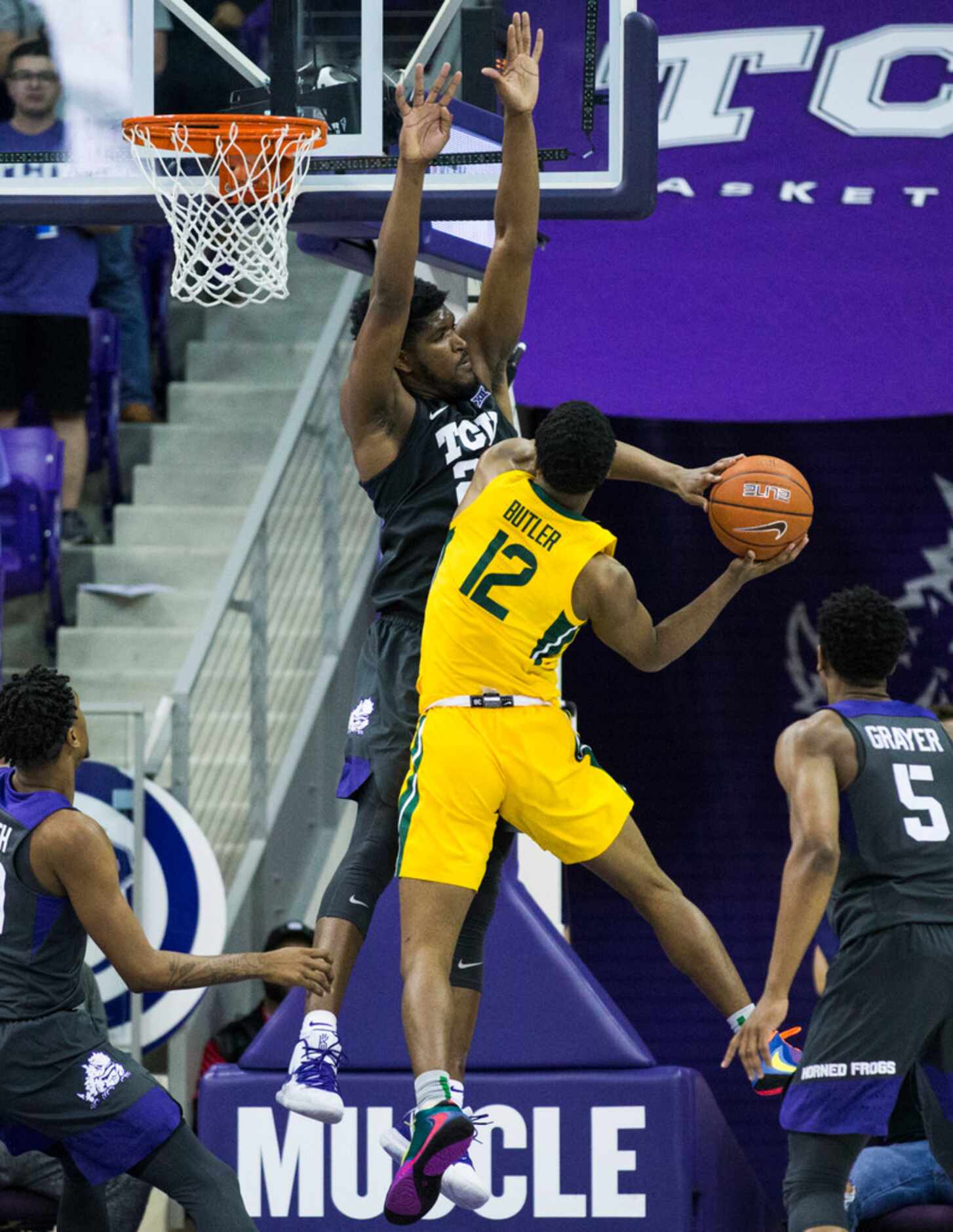 TCU Horned Frogs center Kevin Samuel (21) tries to block a shot by Baylor Bears guard Jared...