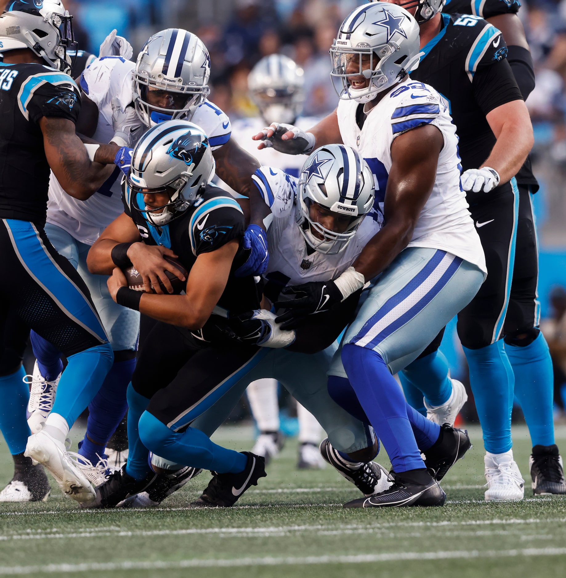 Dallas Cowboys linebacker Micah Parsons (11) sacks Carolina Panthers quarterback Bryce Young...