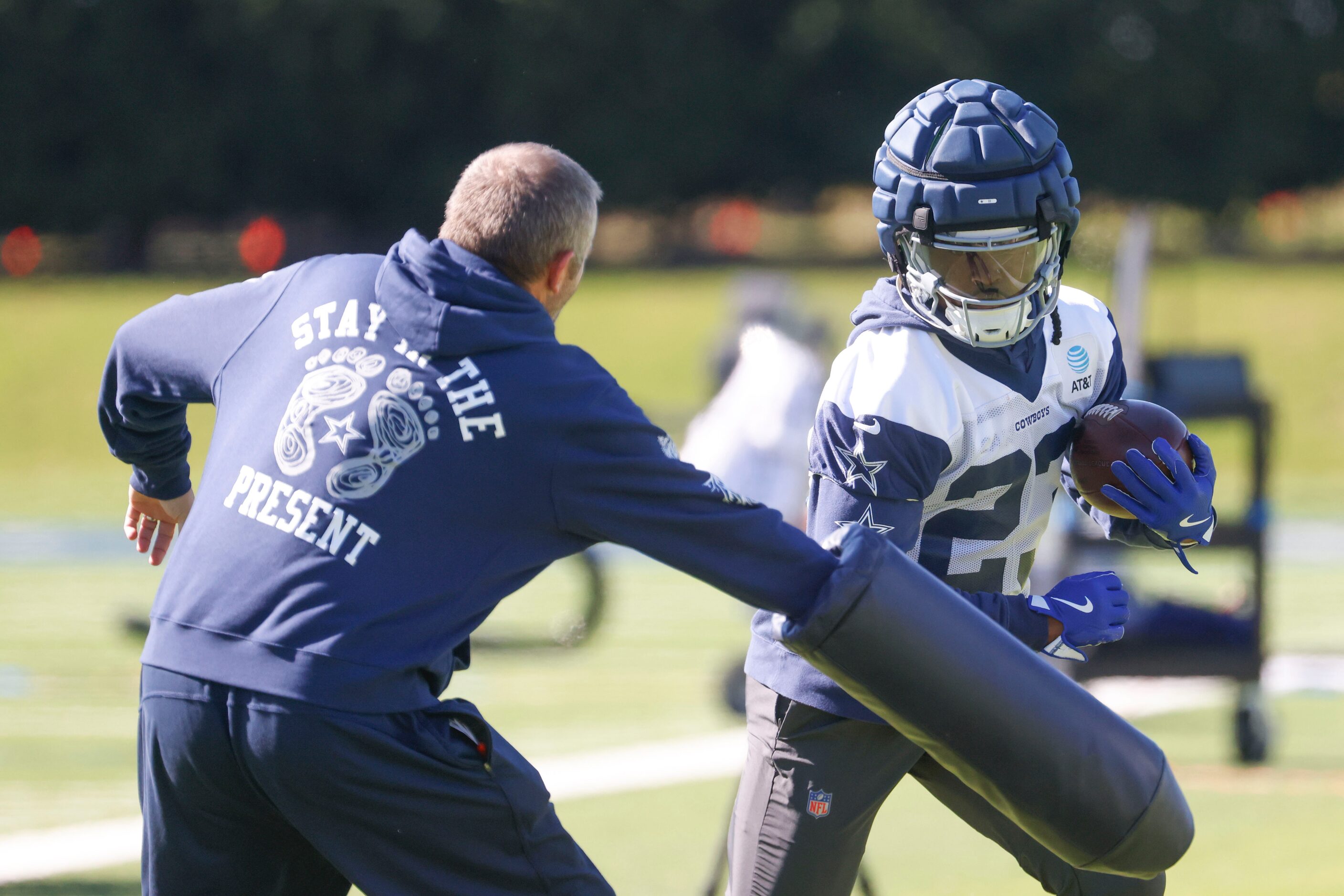 Dallas Cowboys running back Rico Dowdle takes part in a drill during a team practice on...