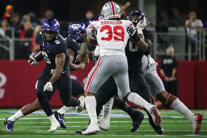 TCU running back Darius Anderson (6) makes a break during the AdvoCare Showdown between the...