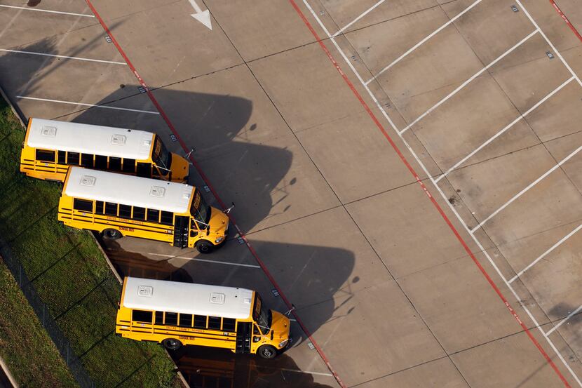 Dallas County School buses in a parking lot in Dallas on Thursday, March 1, 2018. (Vernon...