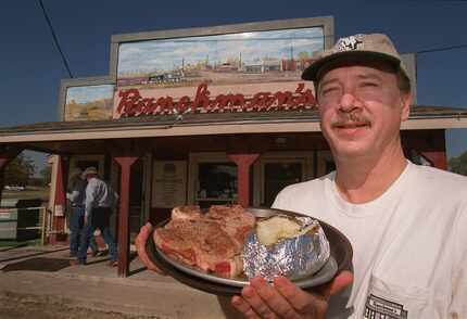 In this DMN file photo, owner Dave Ross shows off the 24-ounze porterhouse steak with a...