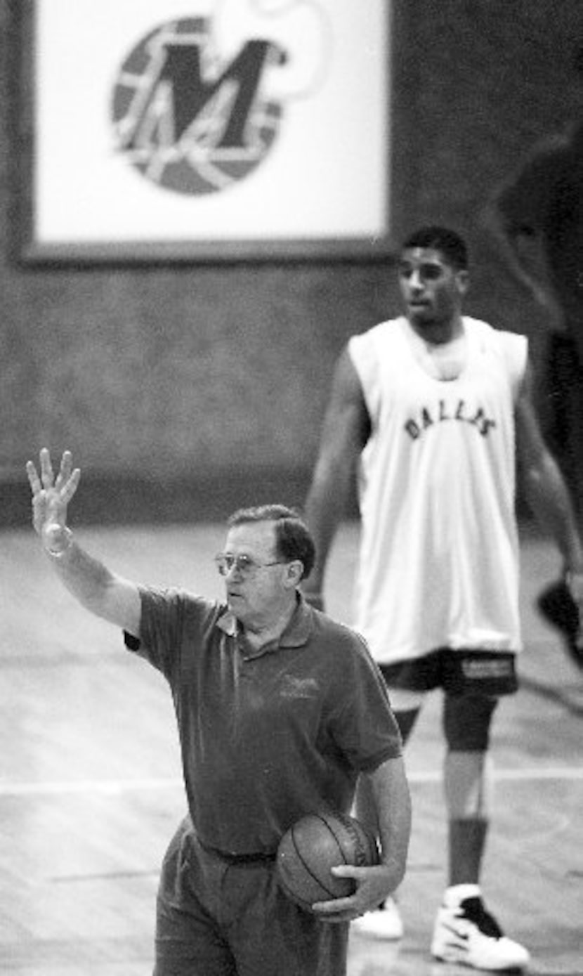 2/13/95--Dallas Mavericks head coach Dick  Motta directs traffic during a scrimmage Monday...