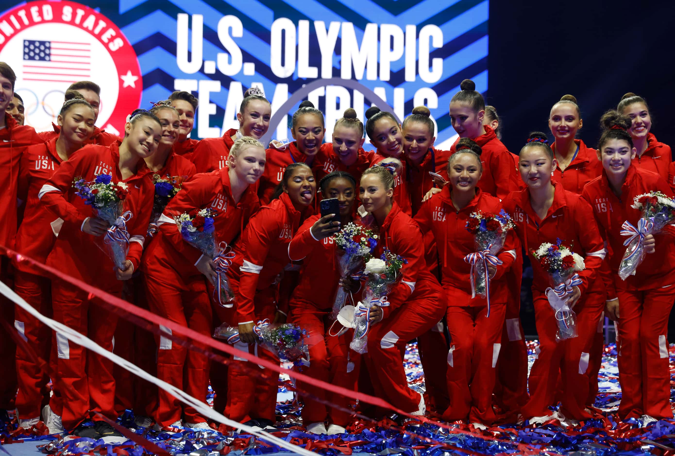 Simone Biles takes a selfie with teammates after the announcement of the U.S. Women's...