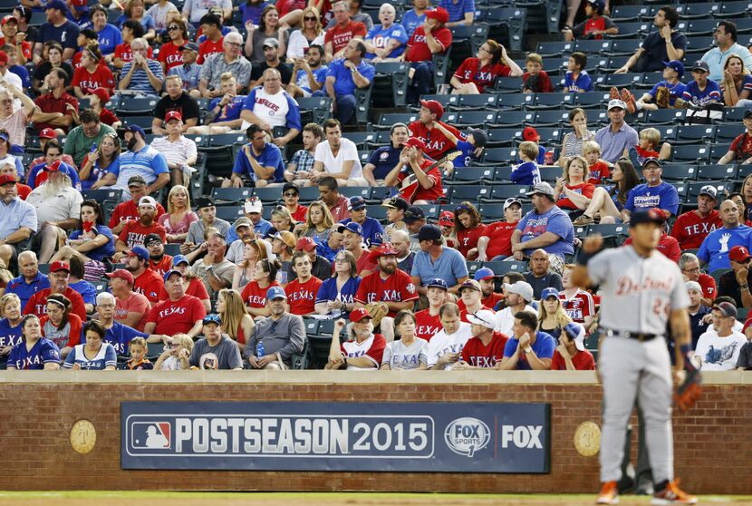 Plenty of seats left during the second inning of play in a game between the Texas Rangers...