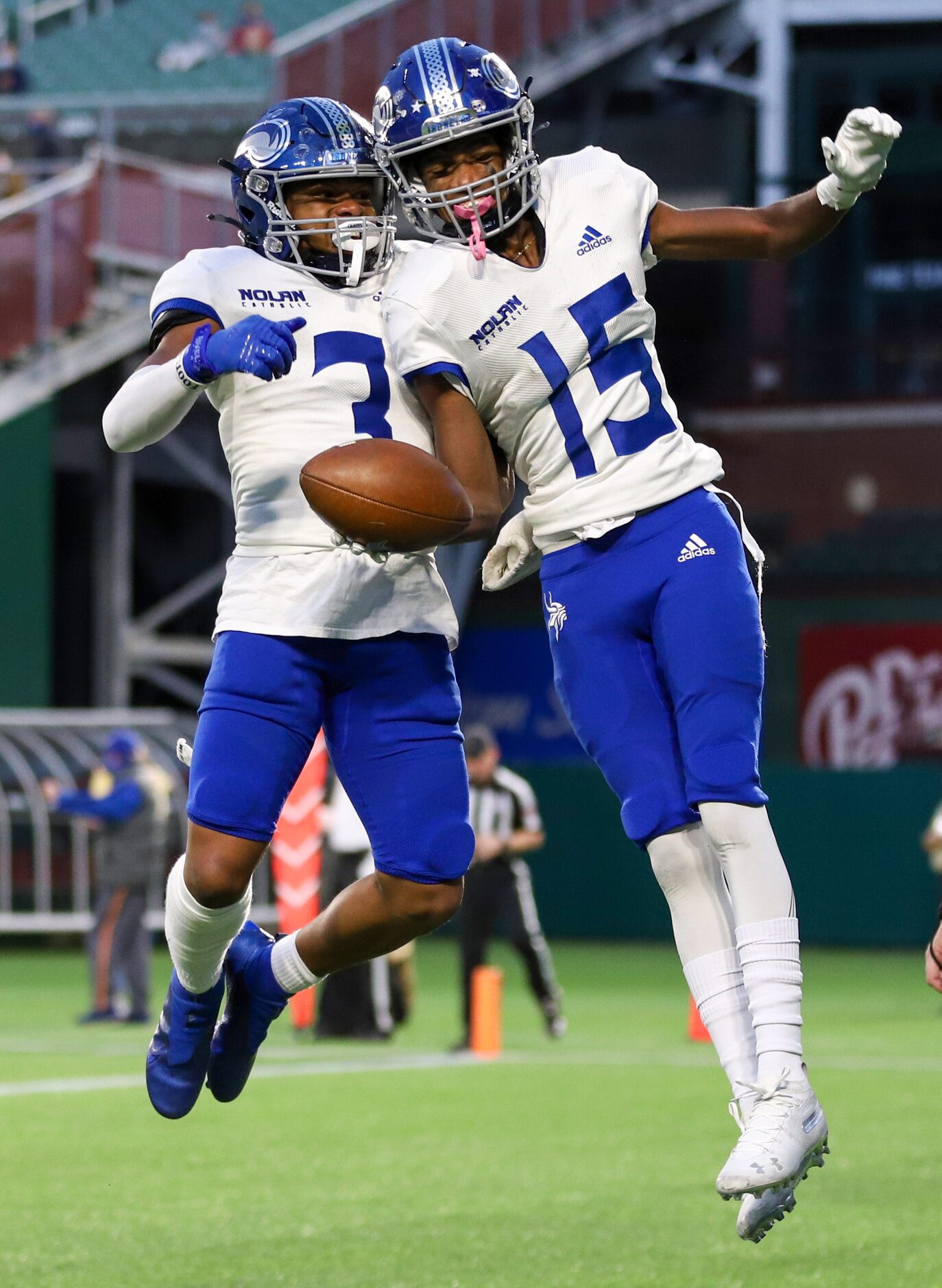 Fort Worth Nolan wide receivers Nelly Ishimwe (15) celebrates a touchdown with Skyler...