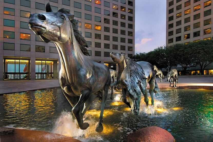 The running mustangs statue at Williams Square in Las Colinas in Irving.