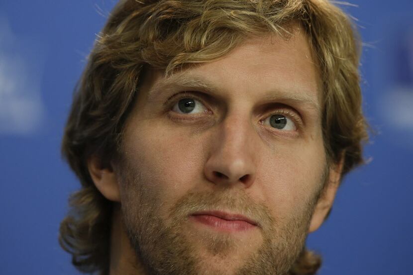 Dallas Mavericks' Dirk Nowitzki attends a news conference prior to a practice session in...