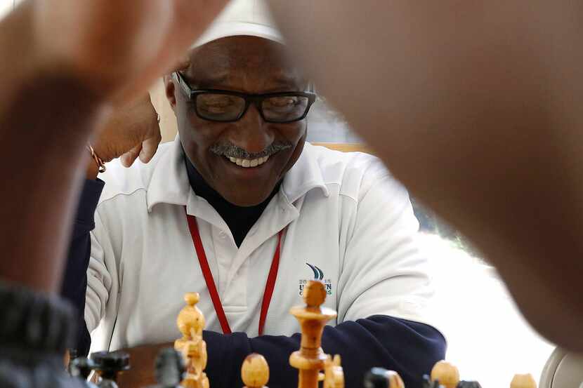 Donald Harris plays chess with Duncanville High School student Gerald Watson during lunch in...