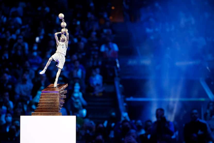Dallas Mavericks owner Mark Cuban unveiled a mini statue of Mavericks All-Star Dirk Nowitzki...