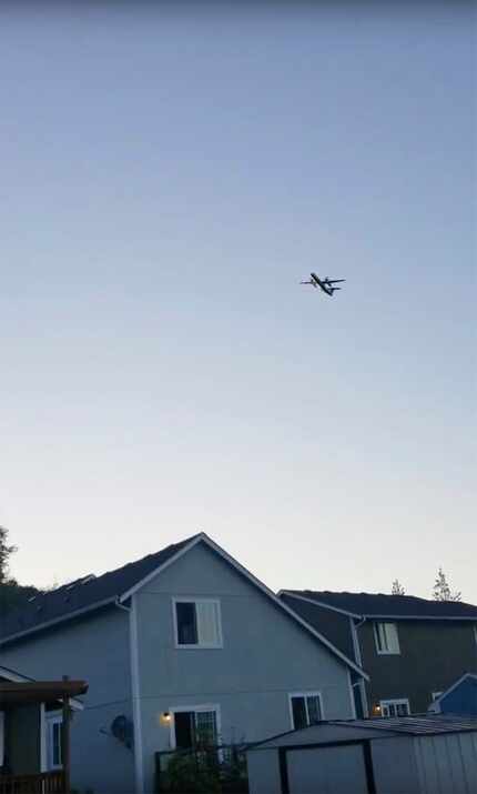 This photo taken from video provided by Courtney Junka shows the stolen Horizon Air...