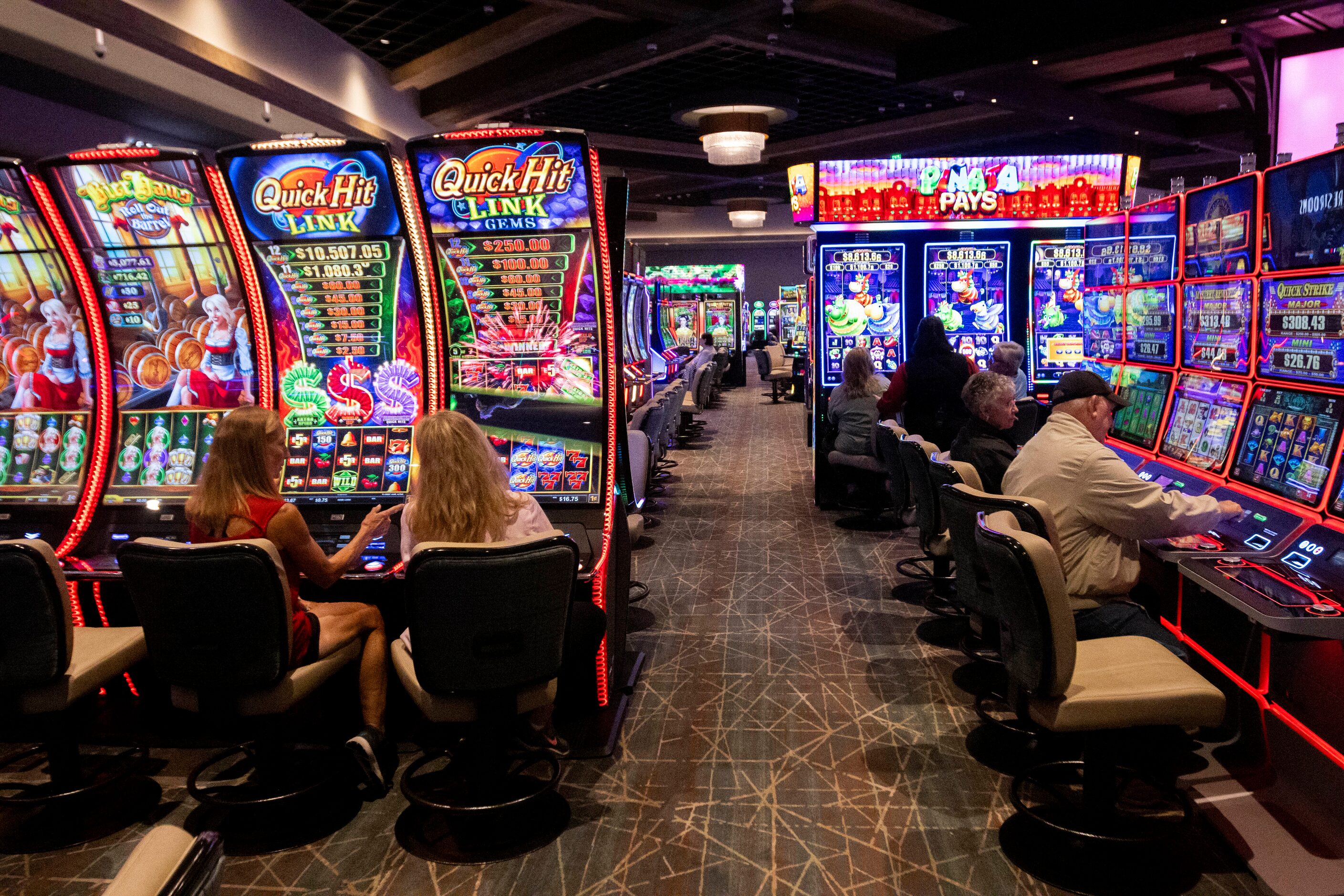 People play the slot machines at Choctaw Landing on Wednesday, April 24, 2024, in Hochatown....