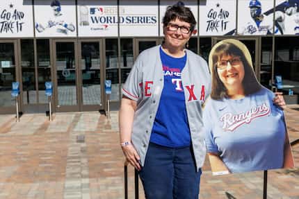 Texas Rangers fan Eleanor Czajka of Arlington poses with a cutout of herself from the 2020...