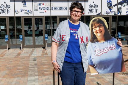 Texas Rangers fan Eleanor Czajka of Arlington poses with a cutout of herself from the 2020...