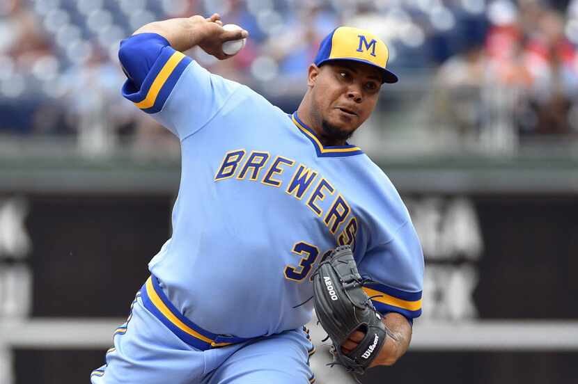 Milwaukee Brewers starting pitcher Wily Peralta throws during the first inning of a baseball...