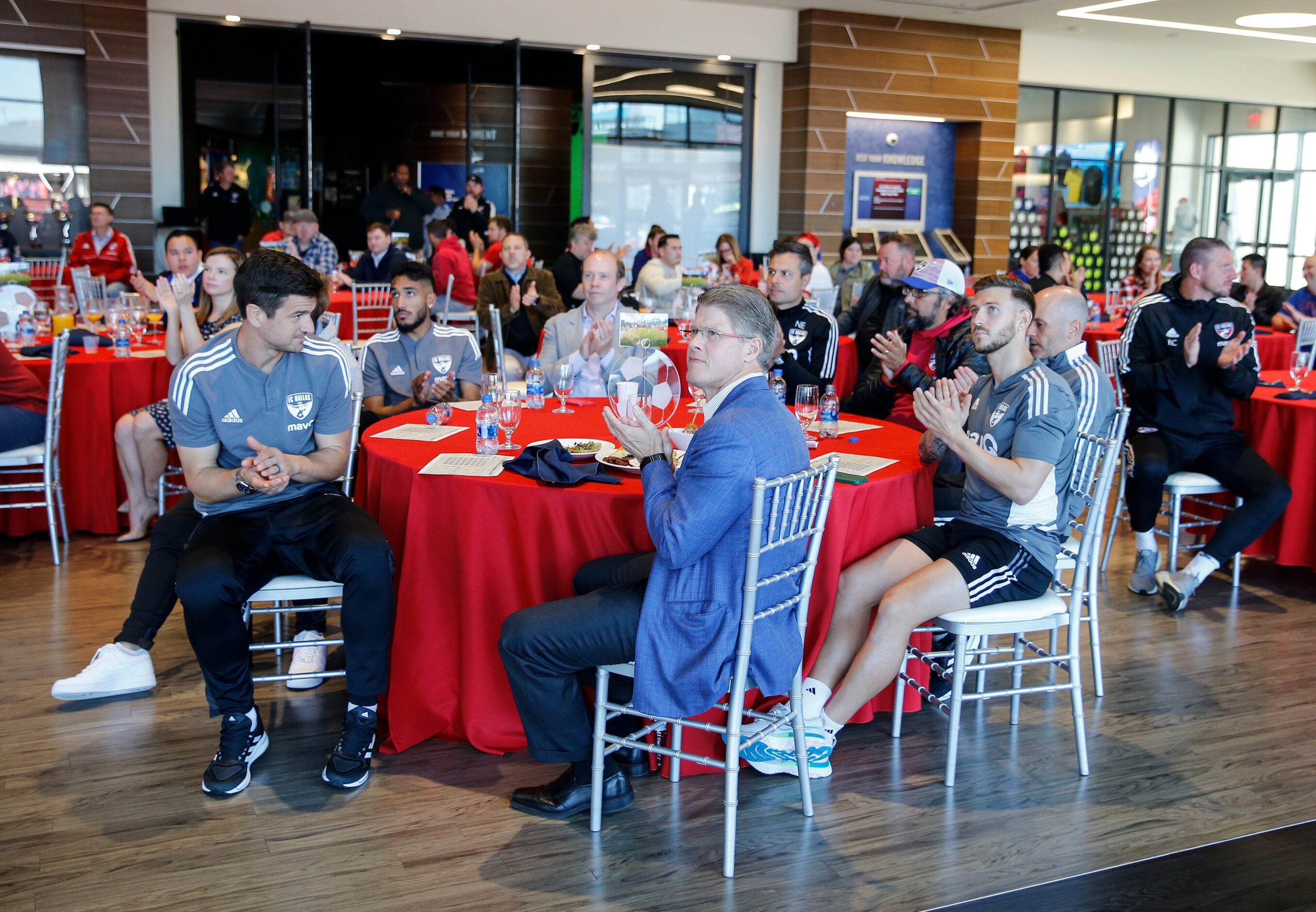 USMNT and FC Dallas players Paul Arriola, right, CEO of the Kansas City Chiefs Clark Hunt,...