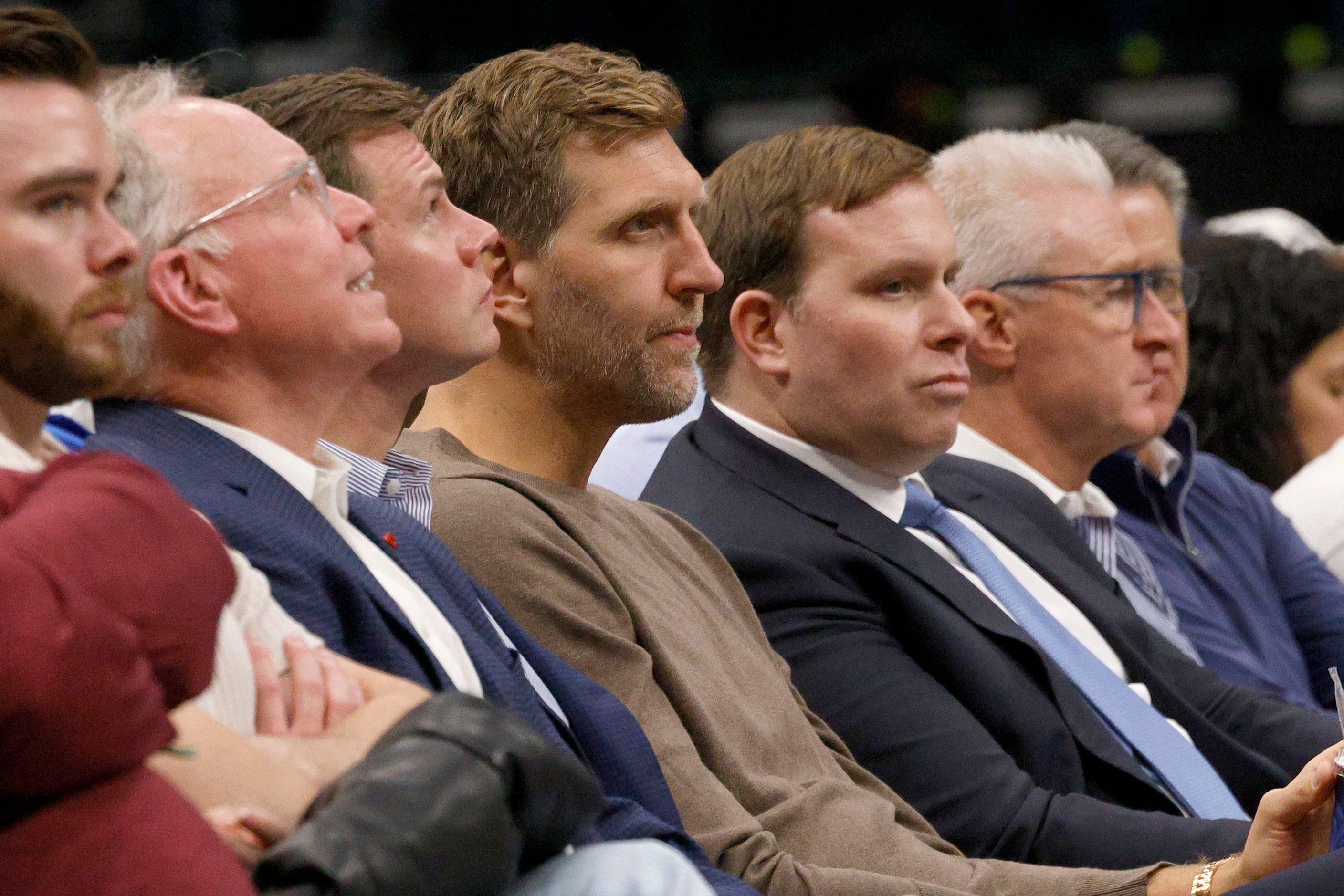 Dallas Mavericks legend Dirk Nowitzki, center, sits with Mavericks governor Patrick Dumont,...