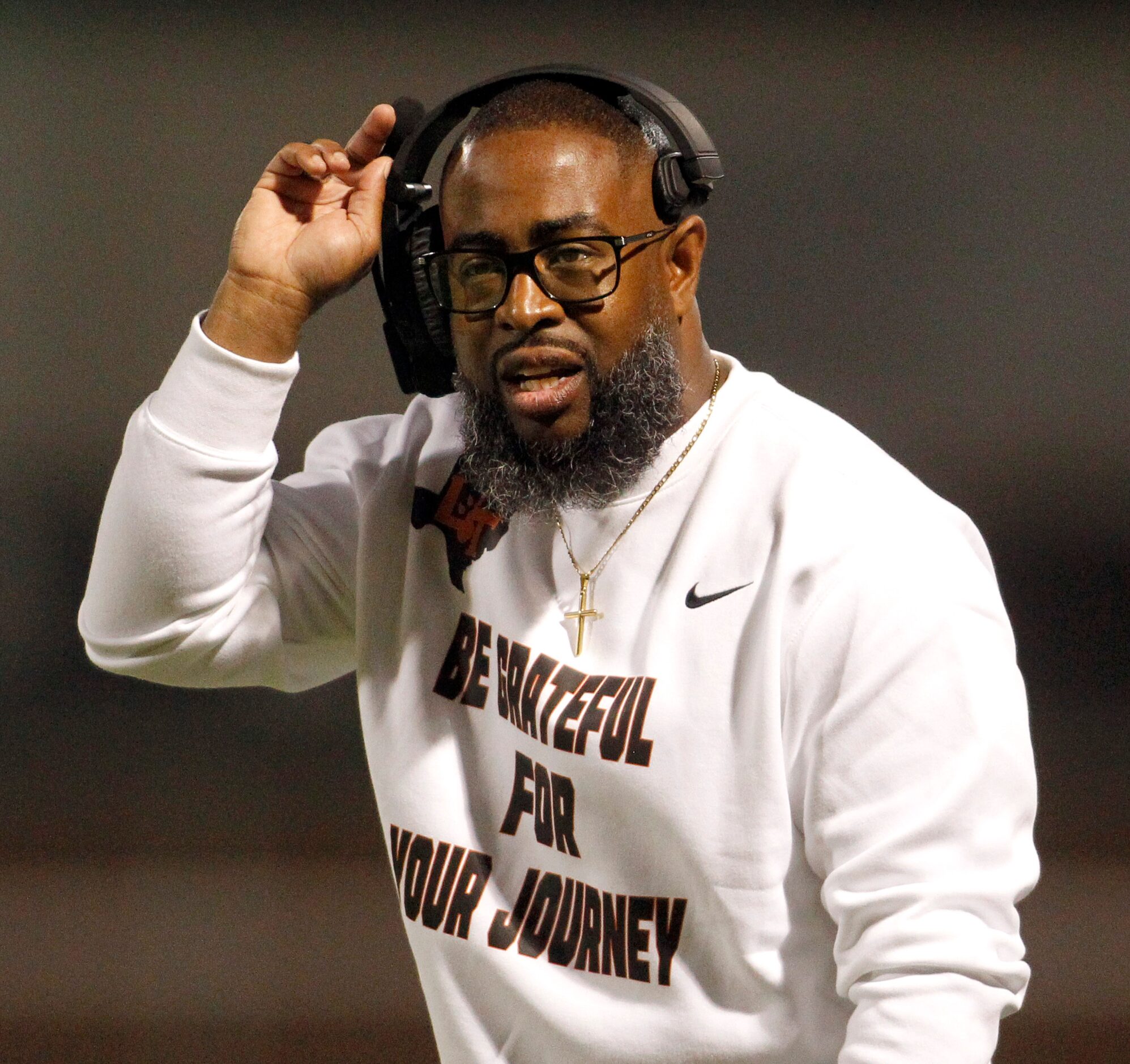 Lancaster head coach Leon Paul confers with a game official during second quarter action of...