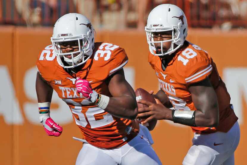 Texas' Johnathan Gray (32) and Tyrone Swoopes (18) are pictured during the Baylor University...