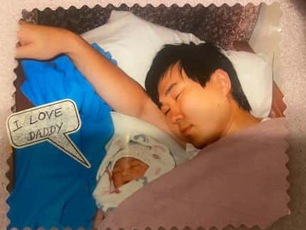 A photo taken by May Joe of Jin Shin and his daughter for her baby book.