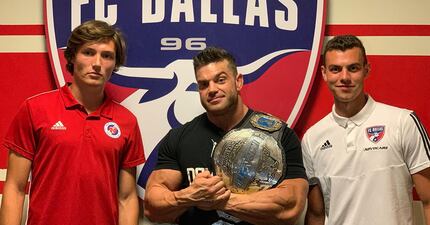 Brecc Evans (left) with Impact Wrestling's Brian Cage and FCD's Callum Montgomery (right). 