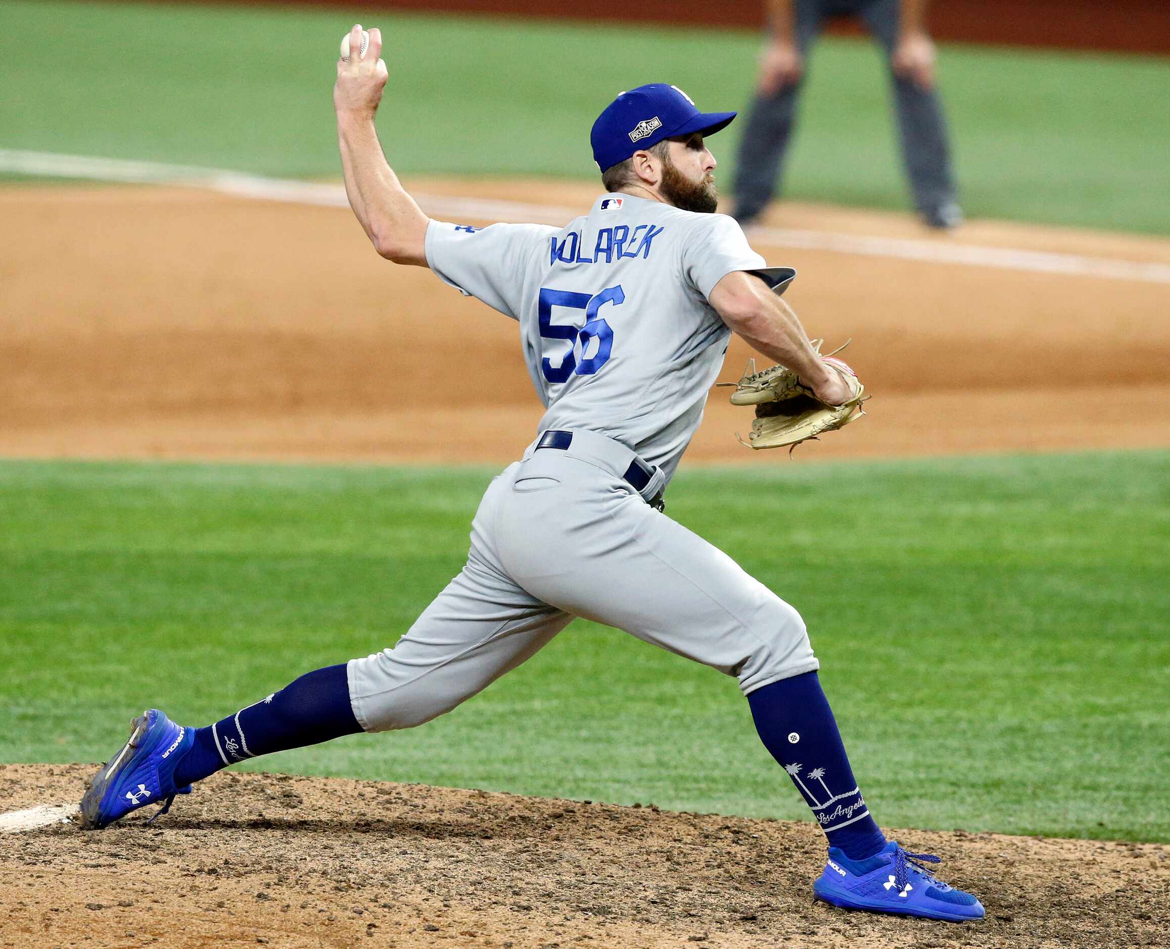 Los Angeles Dodgers relief pitcher Adam Kolarek (56) closes out the ninth inning in Game 3...