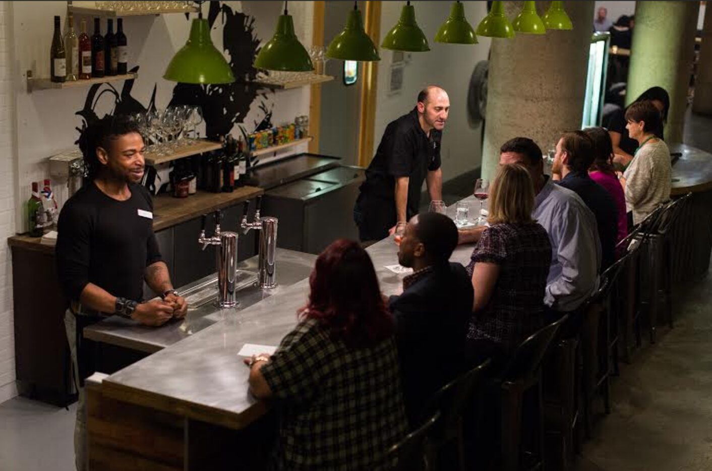 Checkered Past's bar, which inhabits the old Absinthe Lounge space, is partially underground.