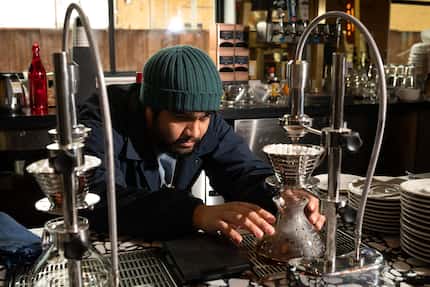 Barista Domingo Hernandez uses a Modbar pour-over system at the new Ascension White Rock.
