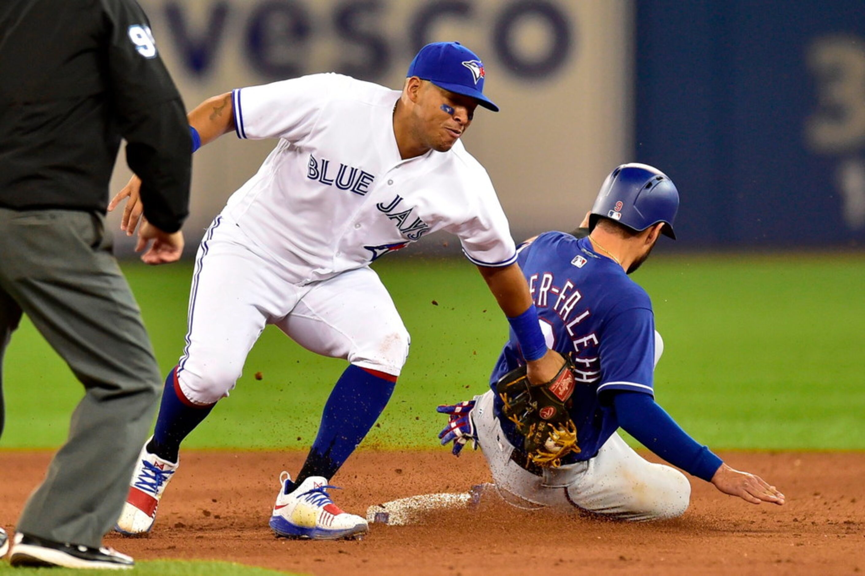 Texas Rangers shortstop Isiah Kiner-Falefa (9) is caught stealing second Toronto Blue Jays...