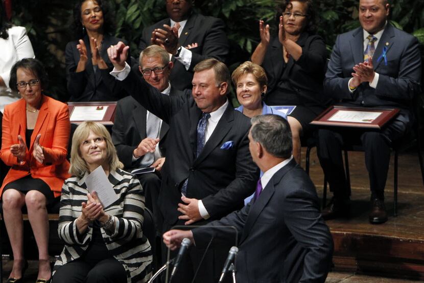 Newly-elected Dallas City Council Member Rick Callahan, District 5, waves to the audience...