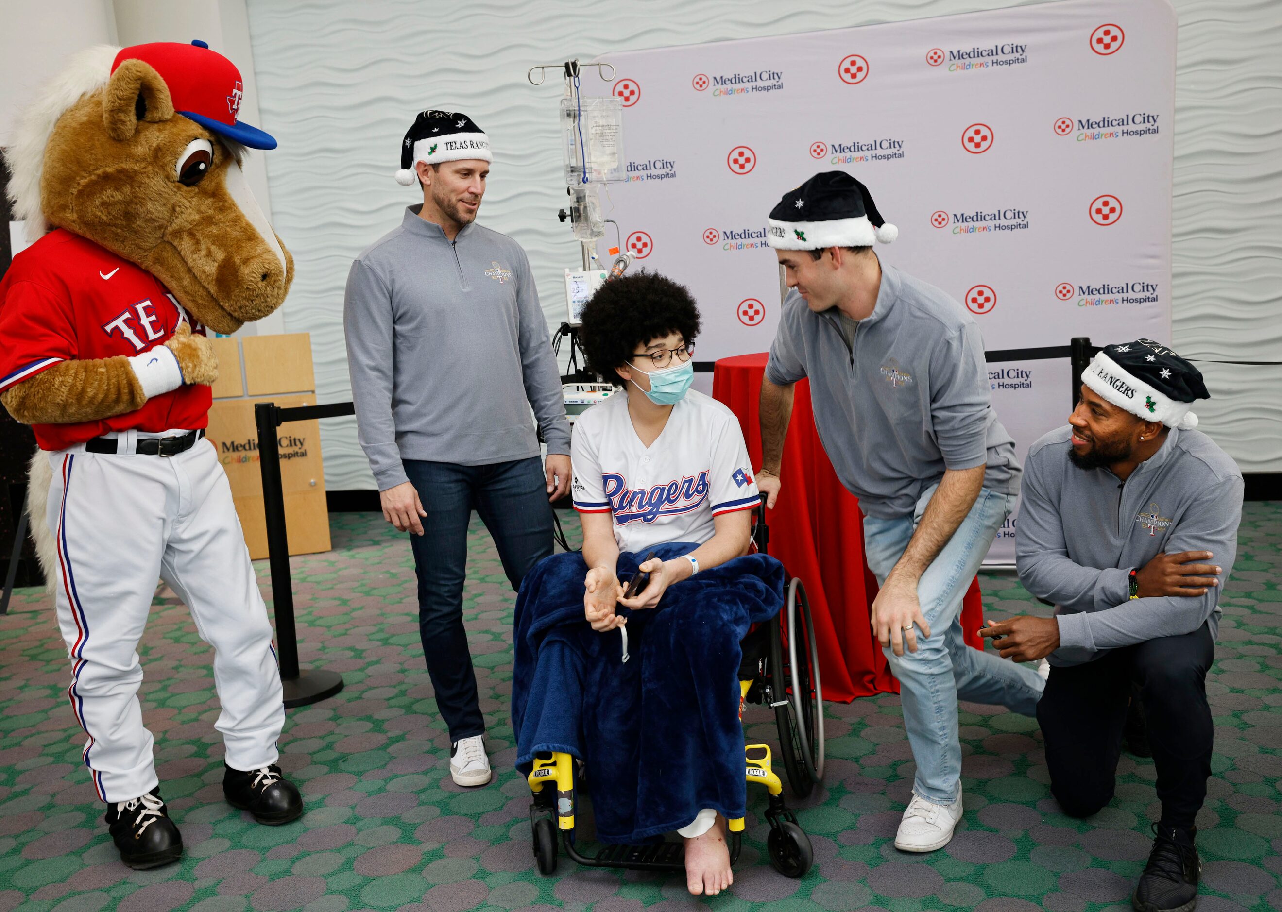 Medical City Children’s Hospital patient Jayden Simmons, 15, of Dallas, talks with...