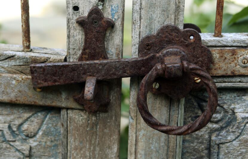 Detail of a gate in the front yard of Suzy and Rob Renz's home in Dallas on Friday, October...