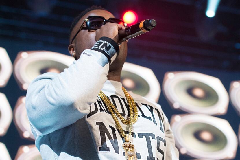 In this Dec. 19, 2014, file photo, Troy Ave performs at "Christmas in Brooklyn" at the...