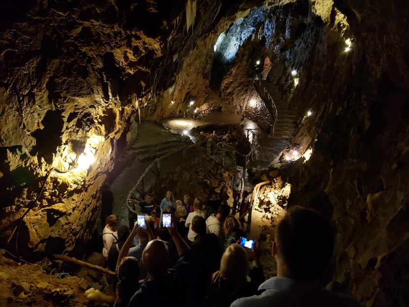 The Grotte de Dinant caves feature impressively large rooms filled with stalactites,...