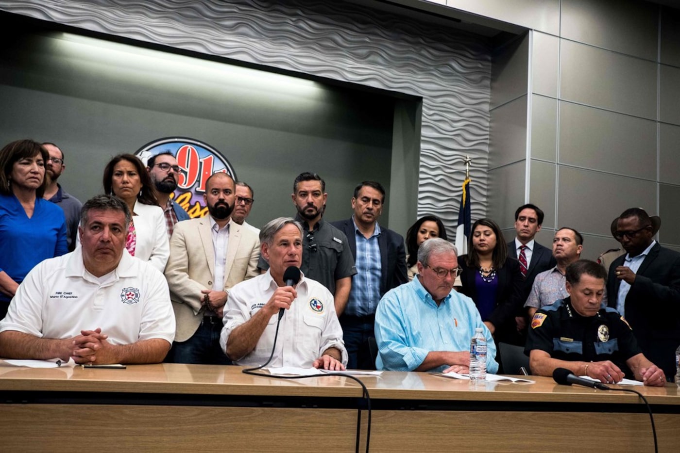 El Paso Police Chief Greg Allen (far right) appeared with (from left) Fire Chief Mario D'...