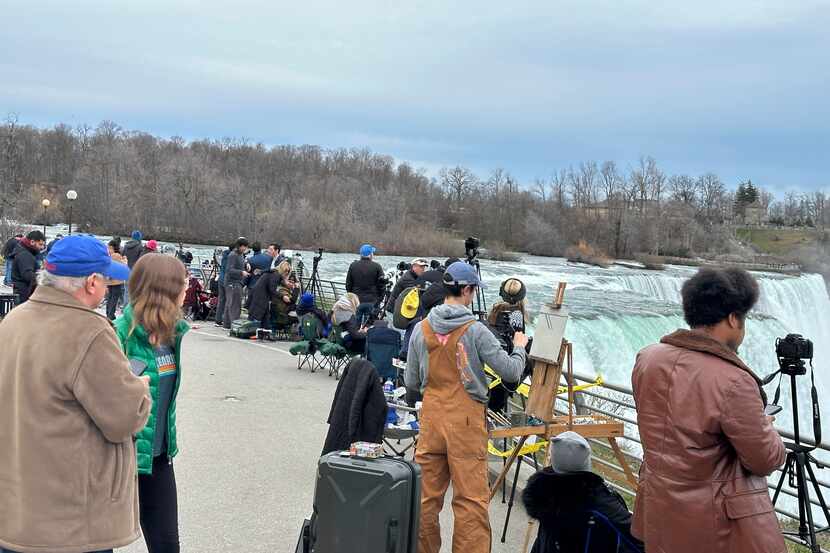 Tourists streamed into Niagara Falls State Park to view the solar eclipse, Monday, April 8,...